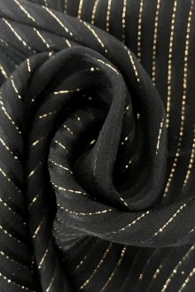 black silk chiffon with gold metallic stripes in a swirl
