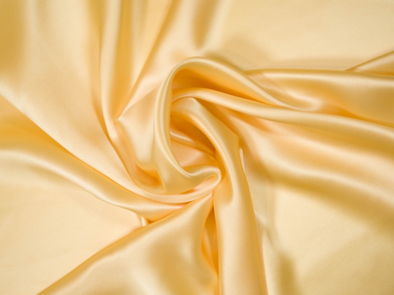Solid silk charmuese in Banana - draped