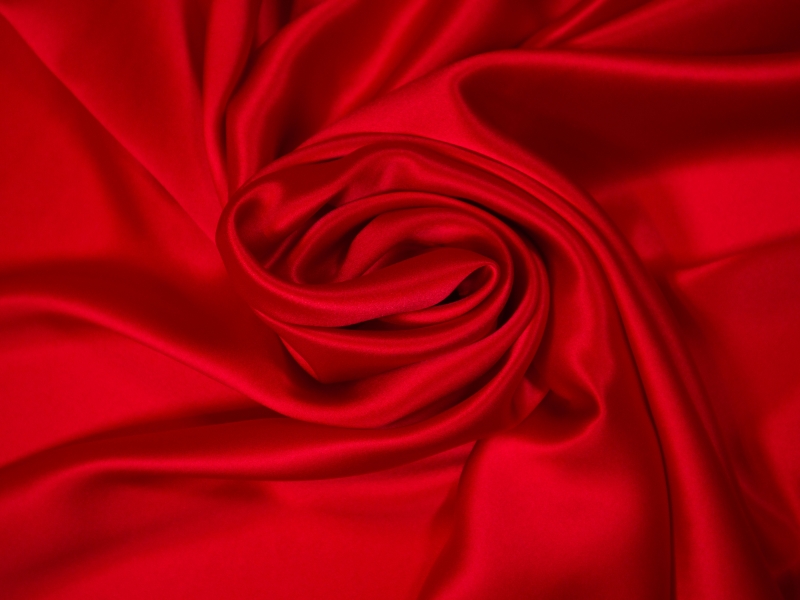 Solid silk charmuese in Cardinal- draped