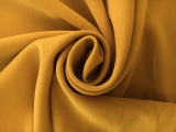 Polyester and Spandex Stretch Crepe in Crown Gold0