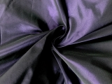 iridescent poly taffeta in purple and black in a swirl